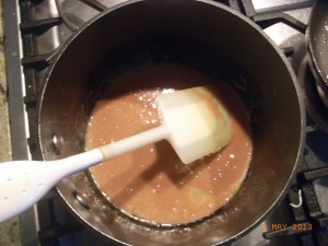 Pink marshmallow, butter and brown sugar melting