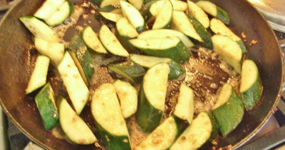 Flash fry zucchini in garlic and cool quickly